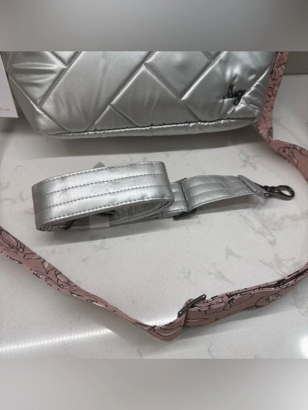 NWT lug Flare Metallic Silver Quilted Crossbody with Pink Floral & silver straps